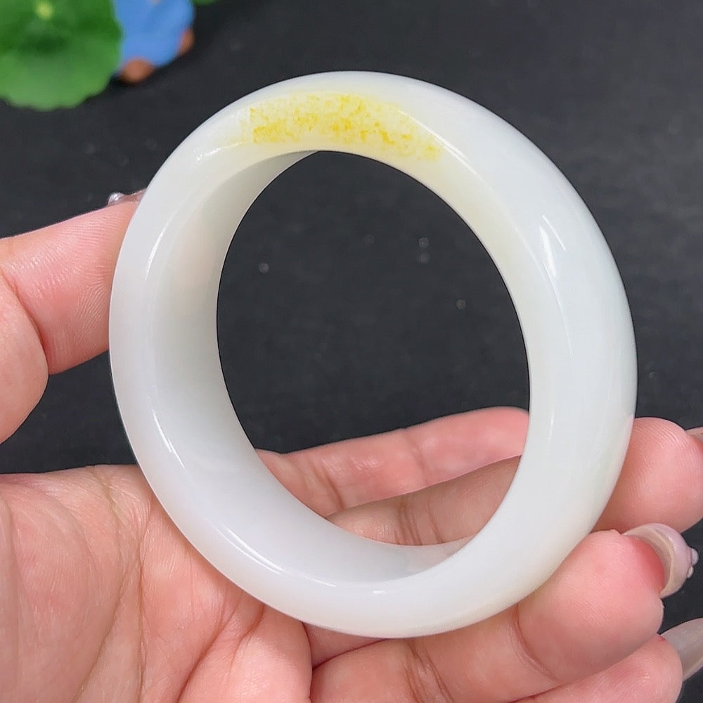 HKHQ Hetian Jade round bracelet, size 55, with approximately 84.4g, showcasing smooth jade beads on a neutral background.