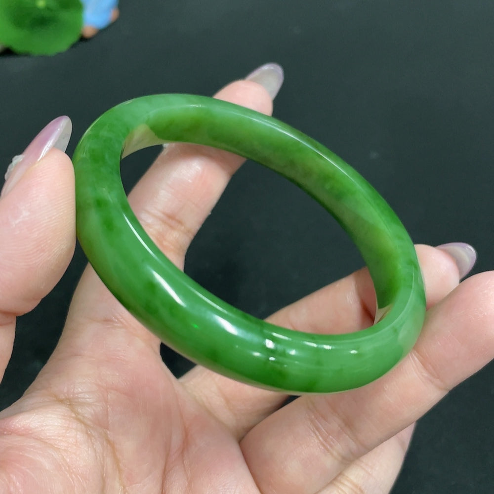 HKHQ Hetian Jade round bracelet, size 59.2, weighing approx. 44.1g, showcasing smooth, polished jade beads.