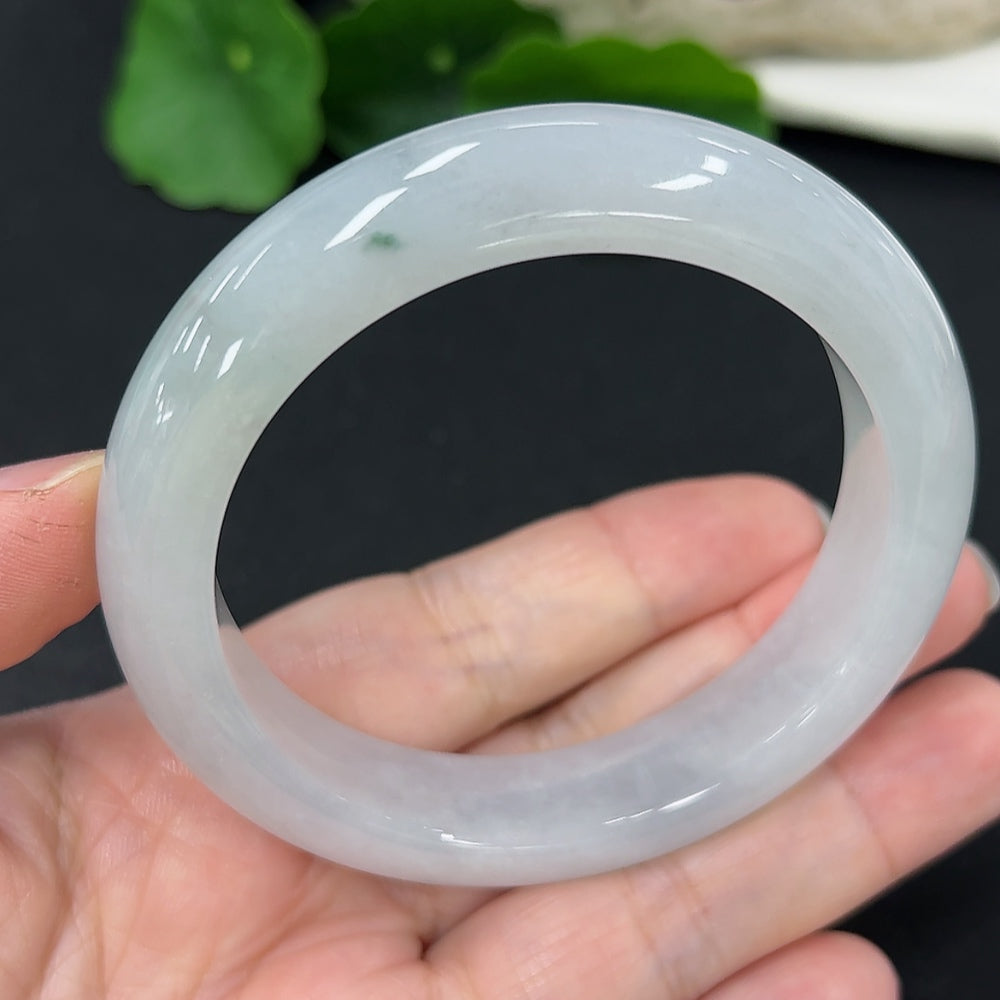 Jadeite round bangle with size 54.6 and weight 59.5g, crafted by HKHQ, showcasing smooth, polished jade surface.