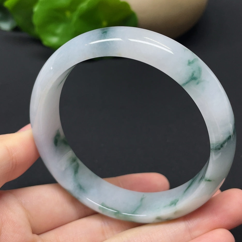 HKHQ jadeite round bangle with mineral components, weighs 54.31g, size 57.9, featuring a smooth, polished finish.