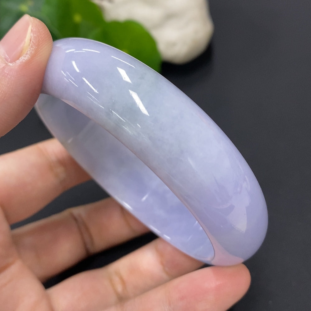 Jadeite round bangle with size 60.2 and weight 71.3g, crafted from green jade, showcasing smooth, polished surface and elegant design.