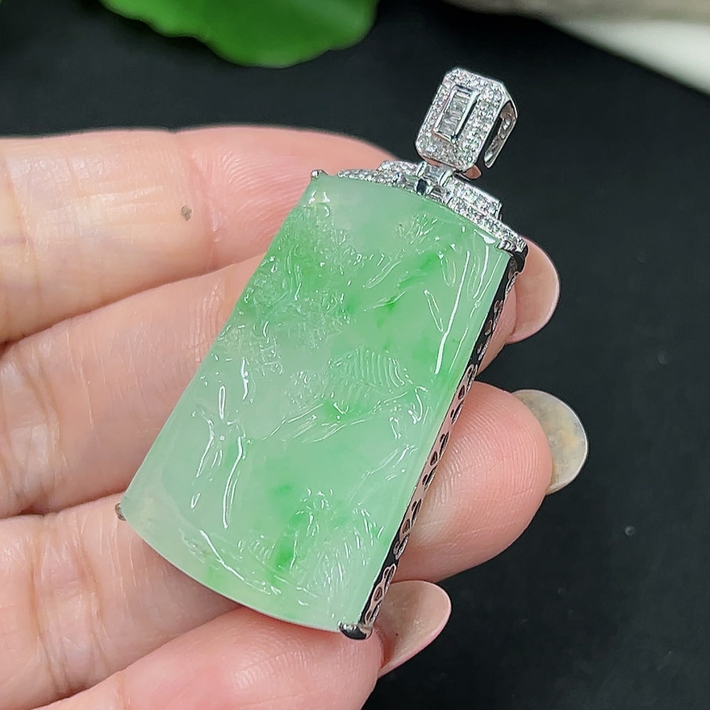 Jadeite landscape pendant with 18K gold and diamond accents, showcasing detailed jade art and elegant design.