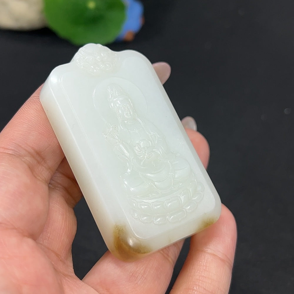 Hetian Jade Pendant featuring Guanyin figure, crafted from green jade, weighs approximately 61.3g, showcasing detailed carving and smooth finish.