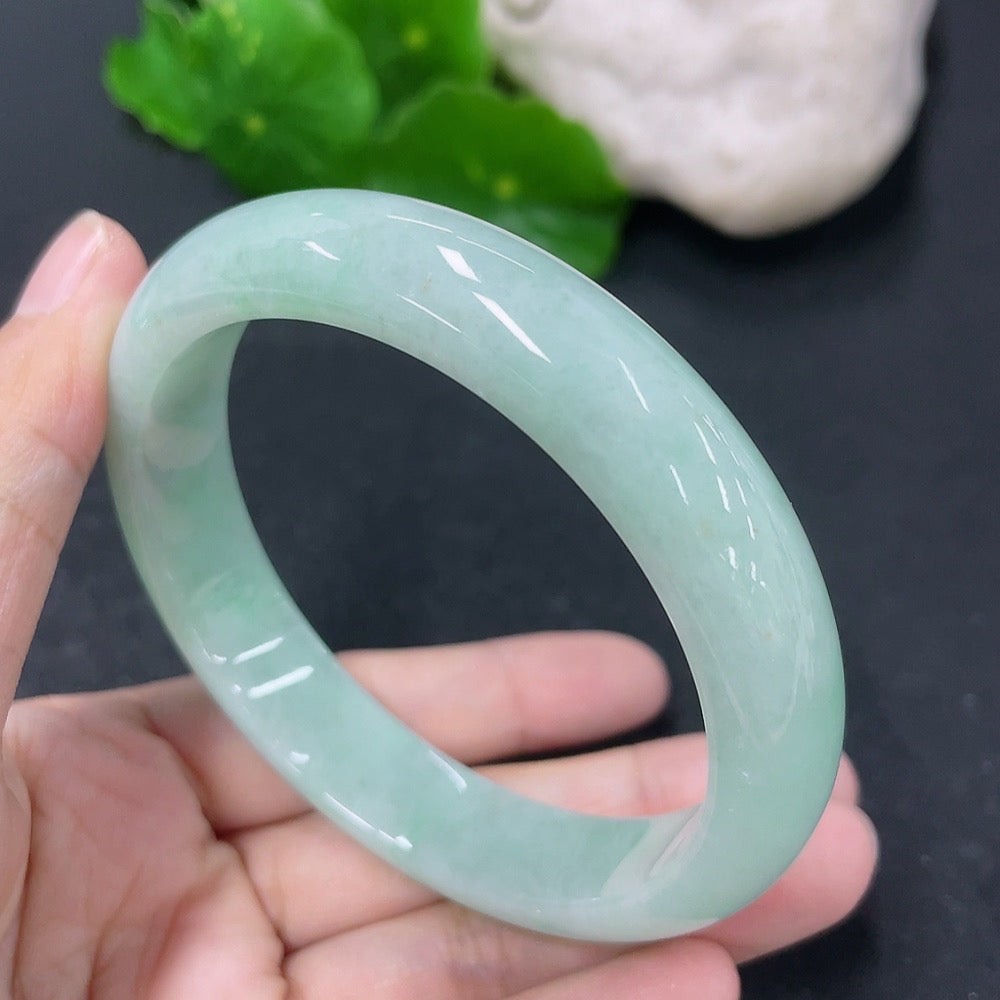 Jadeite round bracelet with 58mm diameter, weighing approximately 54.45g, showcasing smooth green jade beads on a HKHQ jade bracelet.