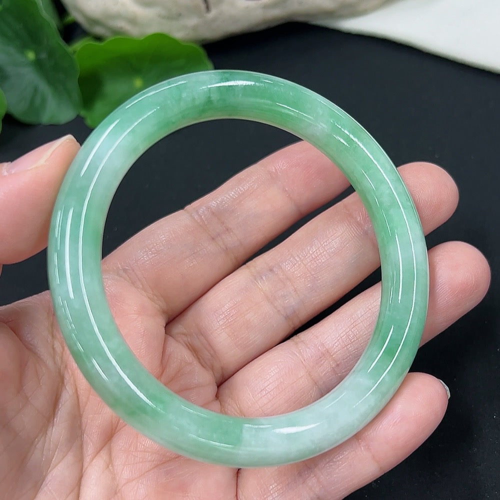 HKHQ jadeite round bangle, size 56, with a total weight of 43.02g, showcasing smooth, polished jadeite jewelry.