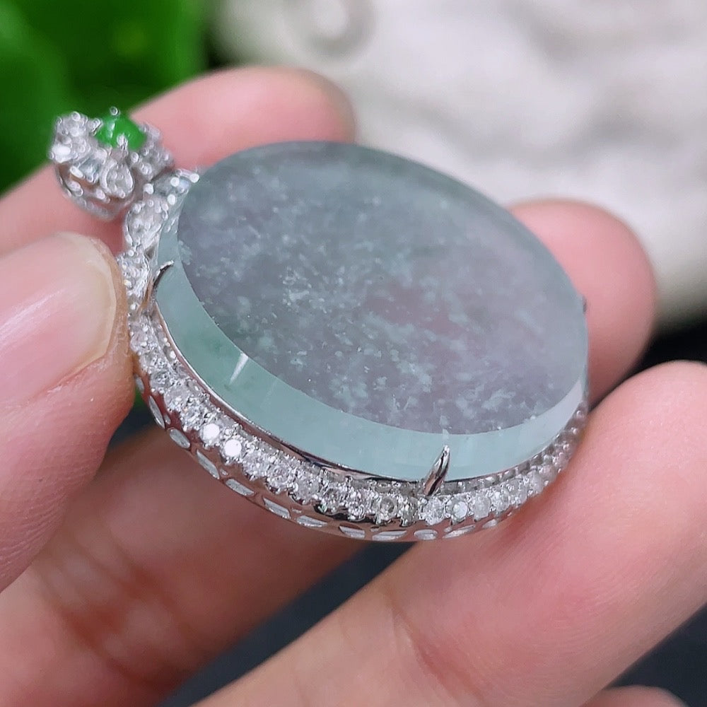 Jadeite plain pendant in 18K gold with diamond accents, showcasing a smooth jade gemstone on a delicate gold chain.