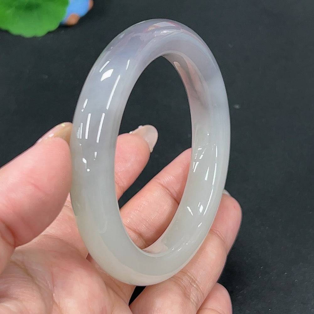 Huiliu certified Hetian jade round bracelet featuring smooth, polished green jade beads on a string.