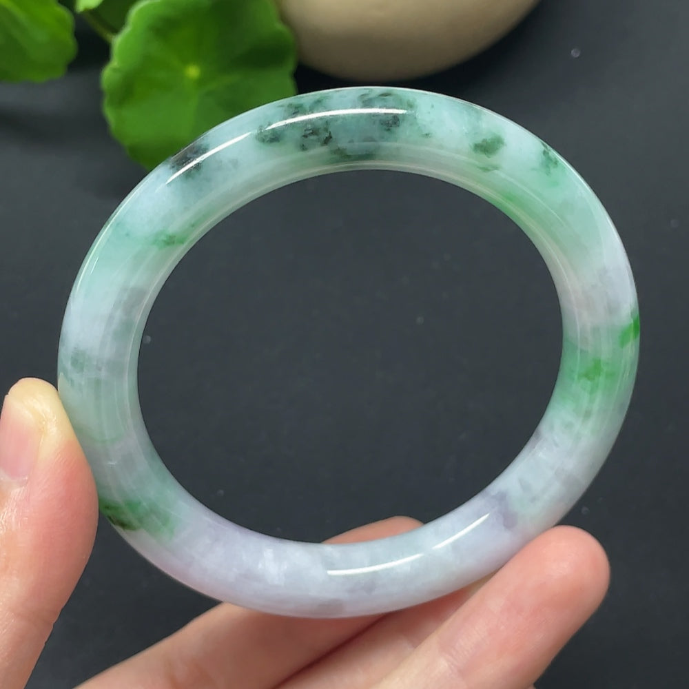 Jadeite round bangle with mineral components, size 55, weighing 48.60g, repaired, showcasing smooth, polished jade jewelry.