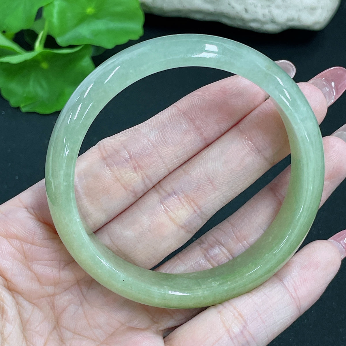 Jadeite round bracelet with a total weight of 51.42g and size 56.8, crafted by HKHQ, featuring smooth, polished jade stones.
