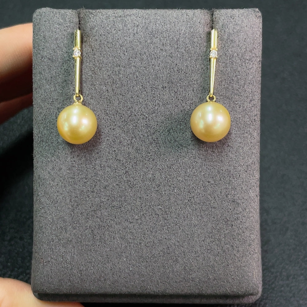 Seawater Pearl Earrings Set in 18K Gold, Approx. 9.2mm, Total Weight About 3.60g, Color Origin Undetermined, Accented with Diamonds