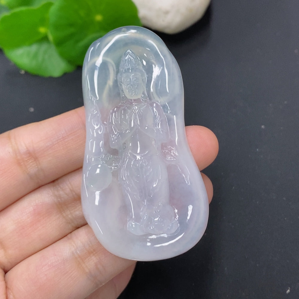 Jadeite Guanyin pendant necklace from HKHQ, detailed view showing the carved religious figure and smooth green jade surface.