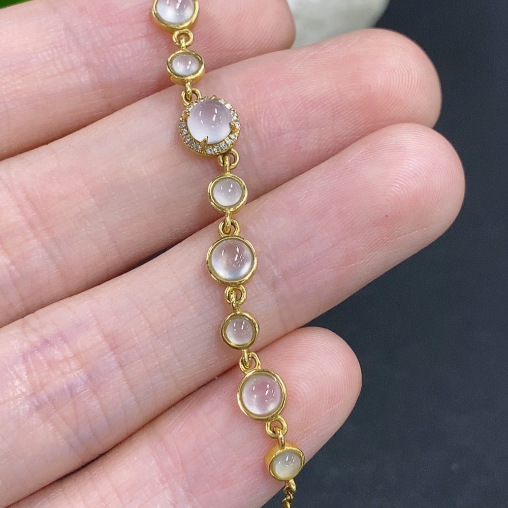 HKHQ jadeite cabochon inlay bracelet with 18k gold and diamond accents, showcasing elegant jewelry craftsmanship.