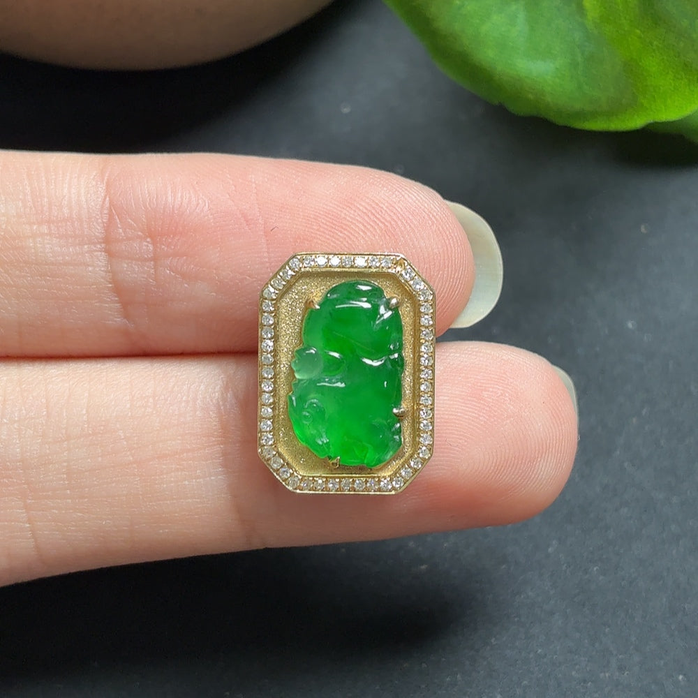 Jadeite inlaid pendant with diamond accents on an 18k necklace, featuring intricate craftsmanship and elegant design.