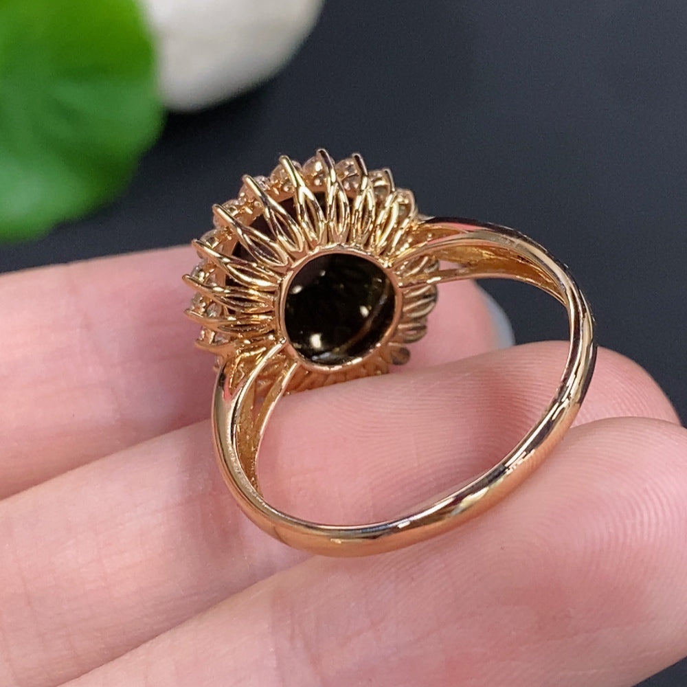Jadeite cabochon ring with 18K gold (only the smallest accent stones are diamonds)