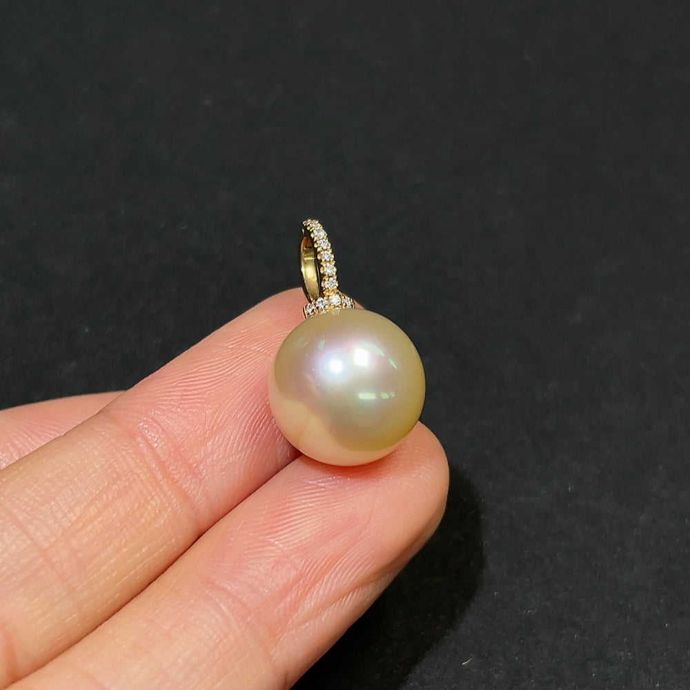 Seawater pearl pendant with diamond accents on 18K gold, approximately 12.4mm in size, from HKHQ featuring natural pearl beauty.