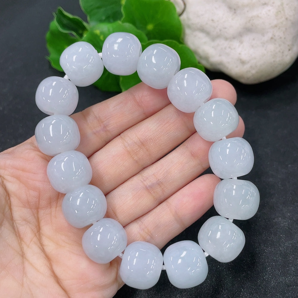 Jadeite bracelet featuring 14.3mm jade beads with a total weight of 79.4g, showcasing smooth, polished green jade stones.