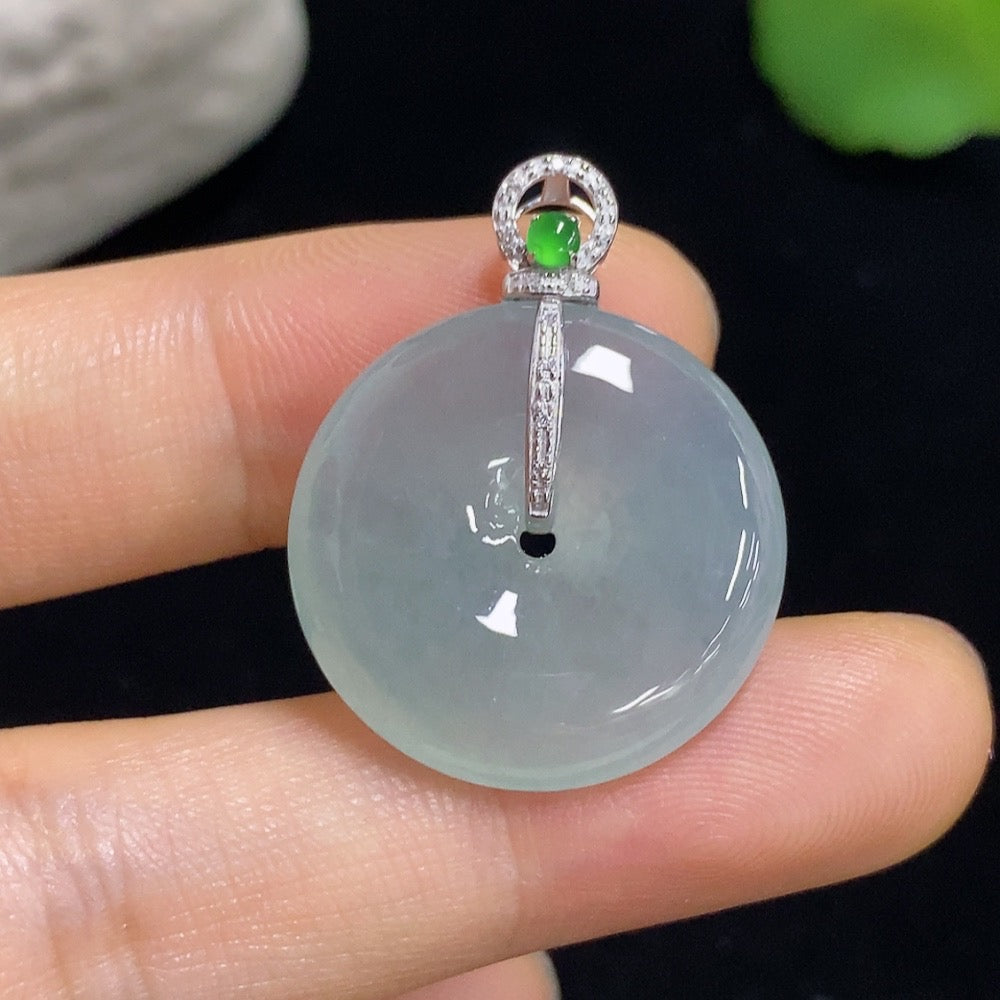 Jadeite Peace Knot pendant with 18k diamond accents, crafted in jade, weighing approximately 5.85g, featuring intricate design details.