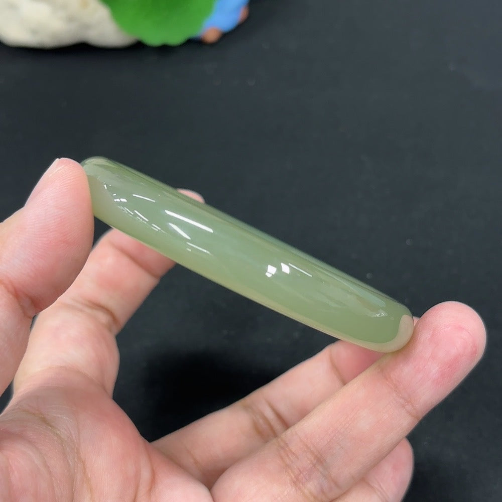HKHQ Hetian Jade round bangle, size 56.9, weighing approximately 49.3g, showcasing smooth, polished jade craftsmanship.