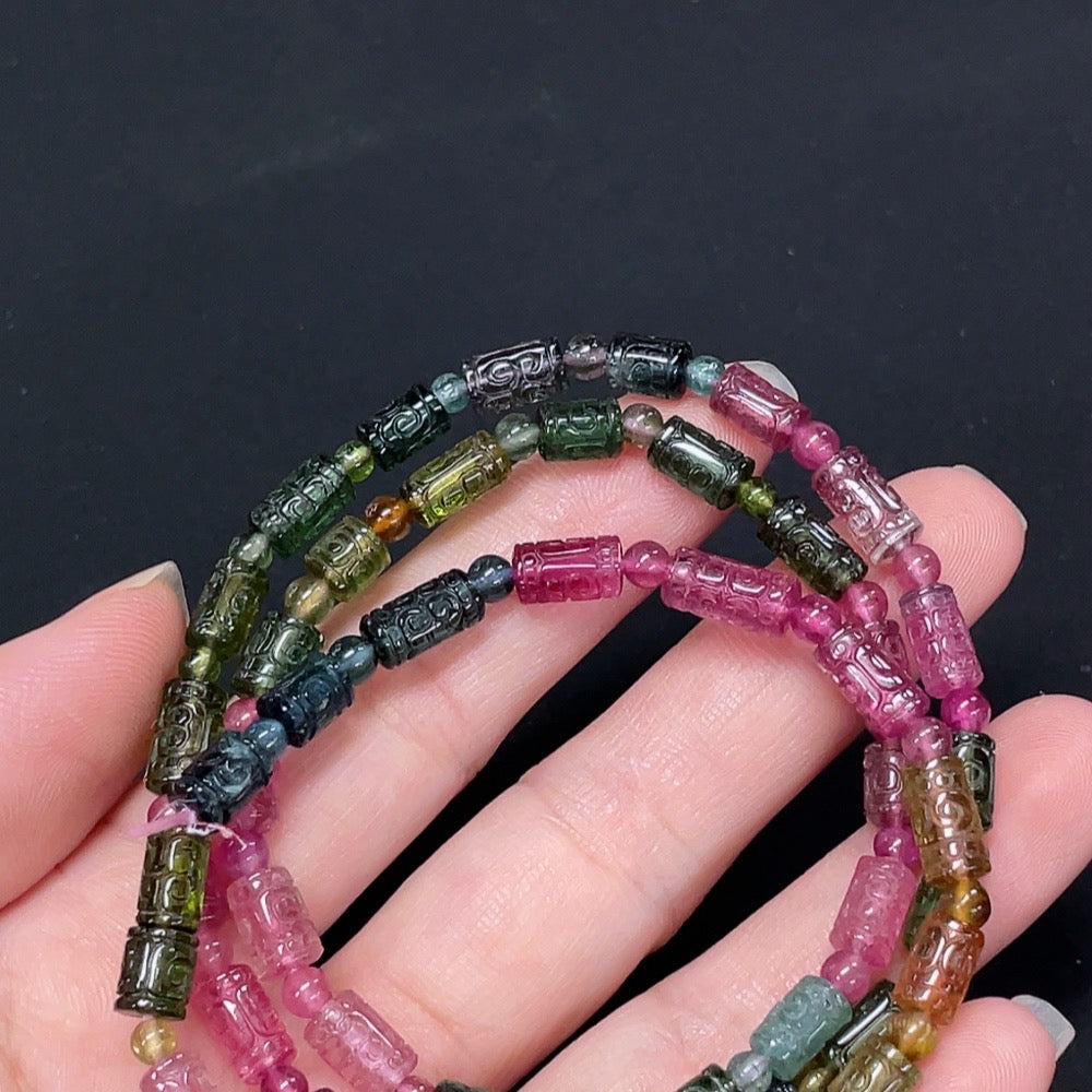 Tourmaline Bead Strand Containing Other Mineral Components Visible Organic Matter