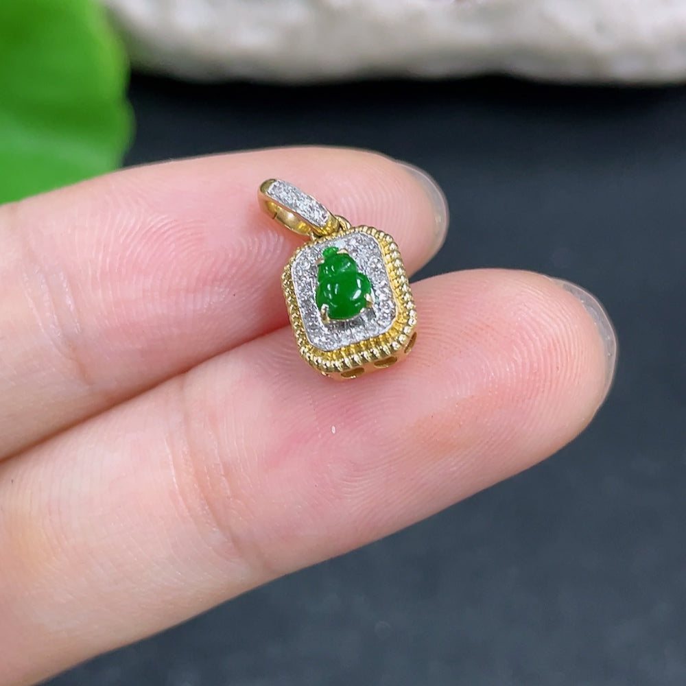 Jadeite gourd pendant with 18k gold and diamond accents, featuring intricate inlay design and a smooth polished surface.