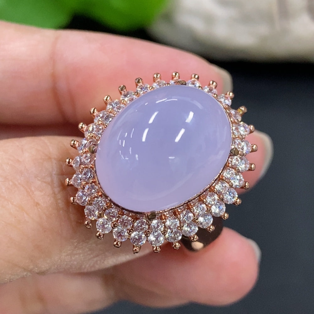 Jadeite cabochon with non-gold inlay, weighing approximately 20.8g, displayed on a neutral background.