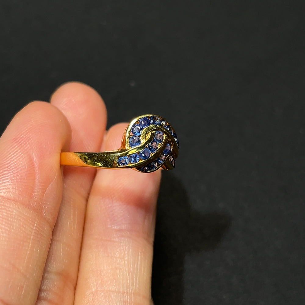 HKHQ sapphire ring with no hallmark, 3.65g, size 15.5, featuring a vibrant blue sapphire stone in a silver-tone band.