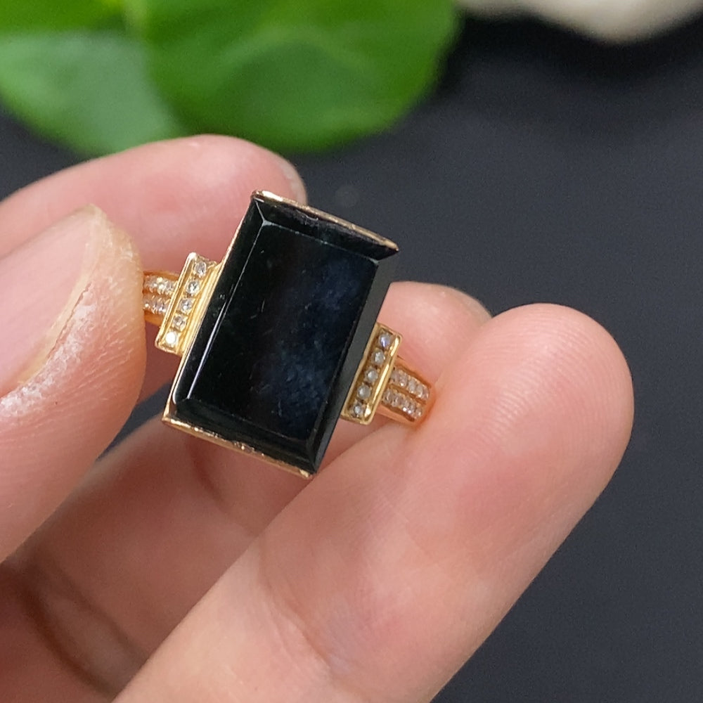 Jadeite ring with diamond accents in 18K gold, size 14, weighing approximately 3.4g, featuring intricate craftsmanship.