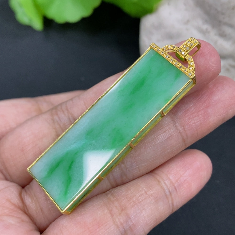 Jadeite plain pendant necklace with 18K gold setting and diamond accent, weighing approximately 10g, from HKHQ.