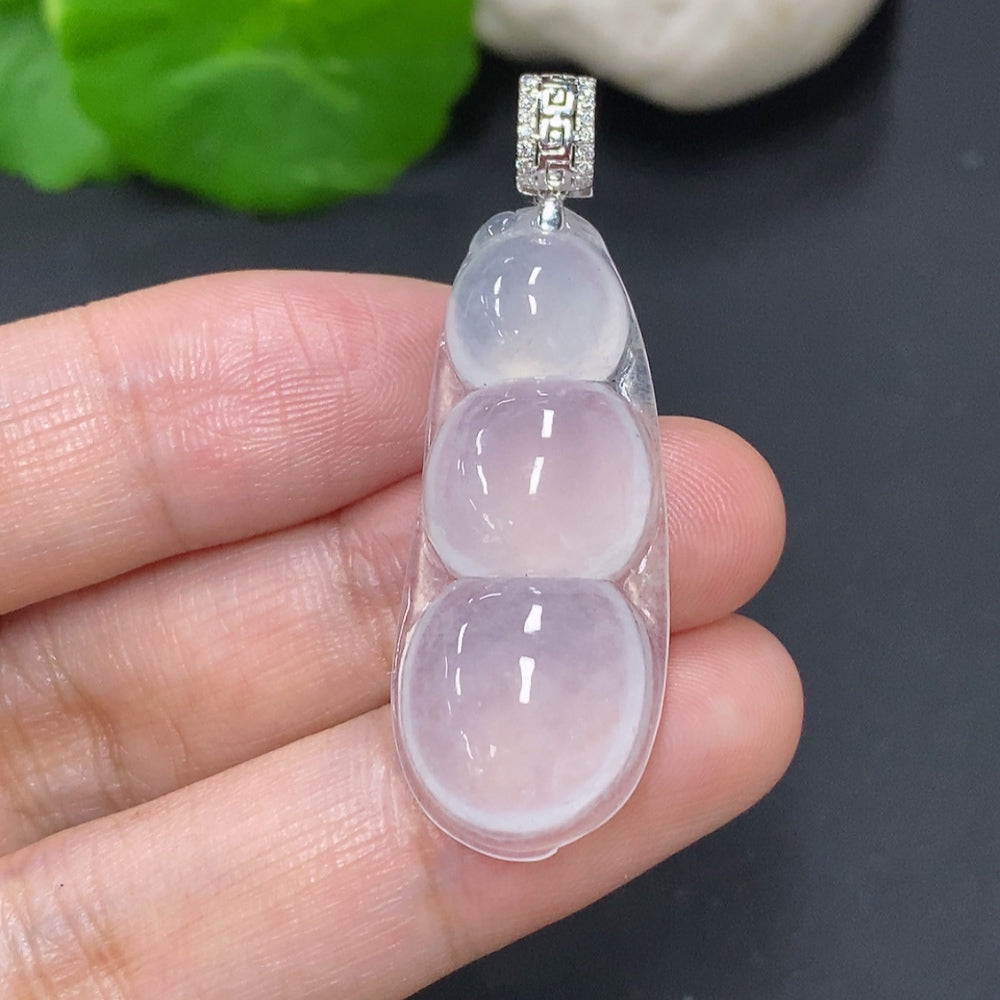 Jadeite lucky bean pendant with 18K gold clasp from HKHQ, showcasing smooth green jade and gold detail, weighing approximately 5.6g.