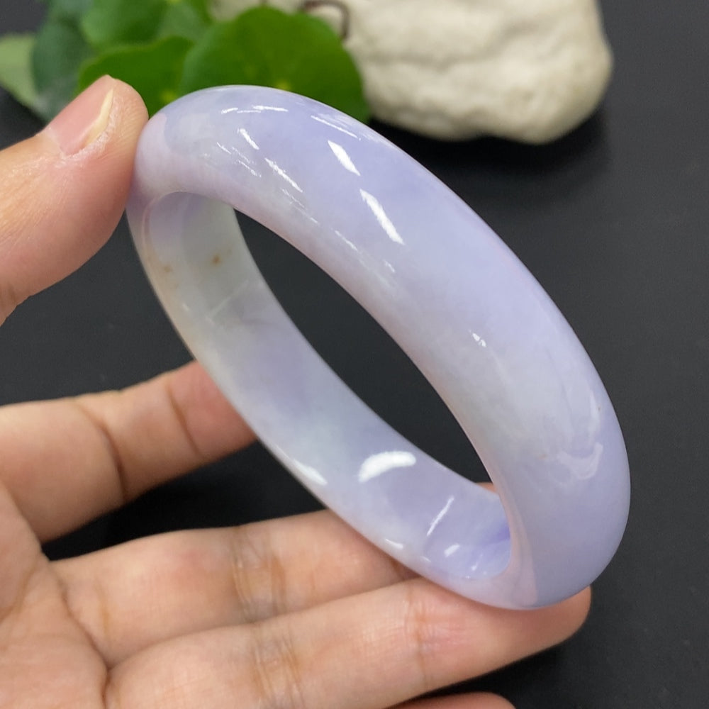 HKHQ jadeite round bangle, size 58.7, weighing 69.6g, showcasing smooth, polished jadeite in a classic circular bracelet design