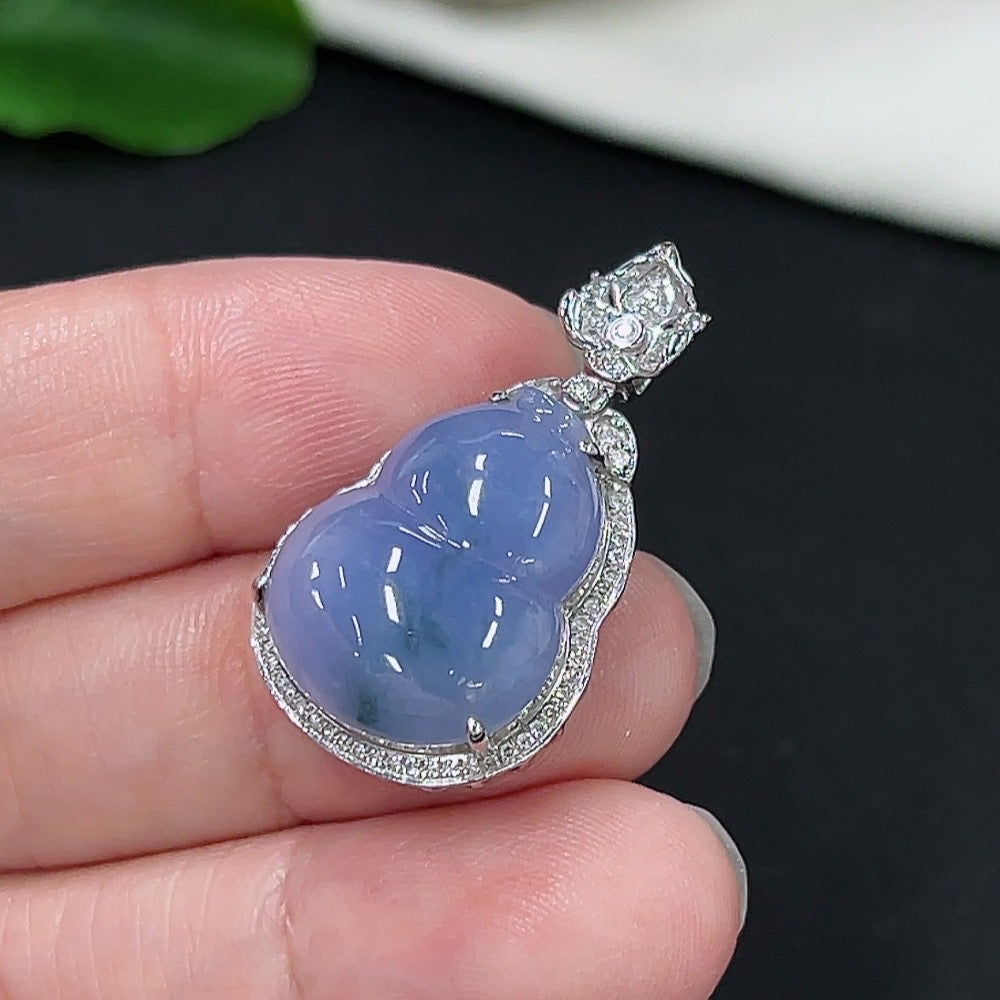 Jadeite gourd pendant with 18k gold and diamond accents, jewelry necklace featuring a detailed green stone design.