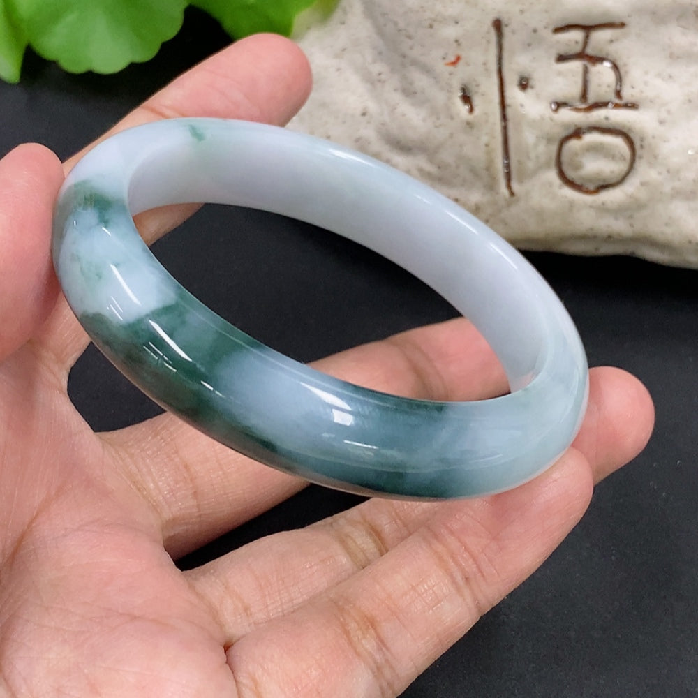 HKHQ jadeite round bangle, 51.68g, size 55.5, smooth polished bracelet showcasing vibrant green jadeite material.