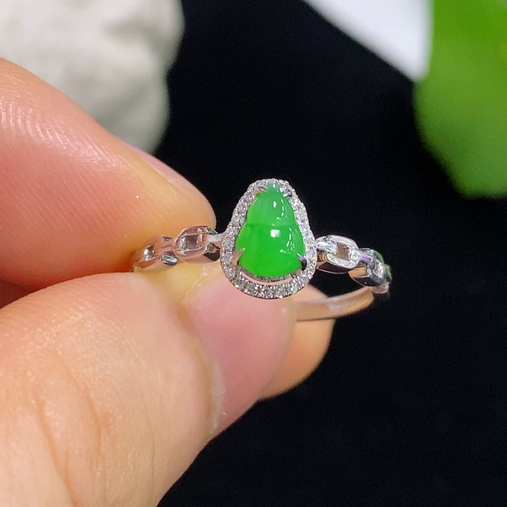 Elegant jadeite ring with 18k gold and diamond accents, size 13, weighing approximately 2 grams, by HKHQ.
