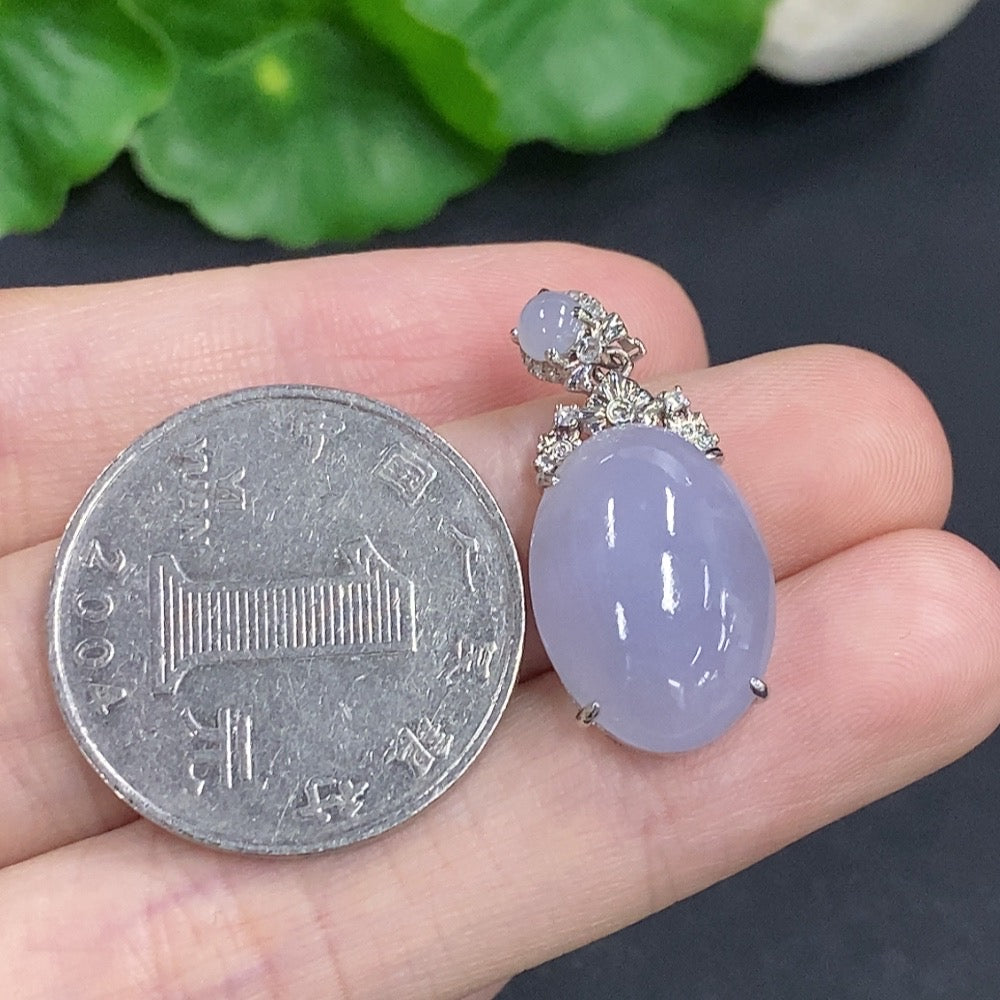 Jadeite cabochon pendant with 18K gold, non-diamond (too small to determine natural origin)