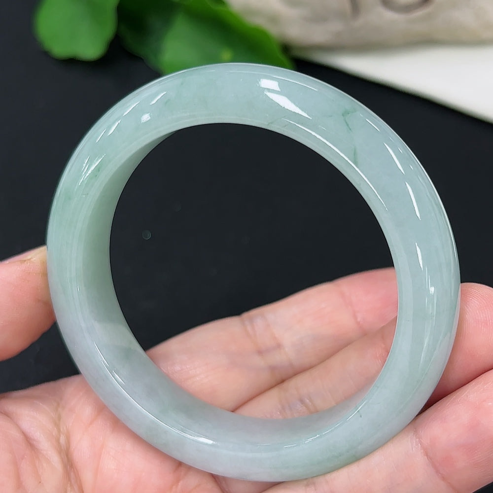 Jadeite round bangle in size 53.7 with approx. 56.5g weight, showcasing smooth, polished jade jewelry by HKHQ