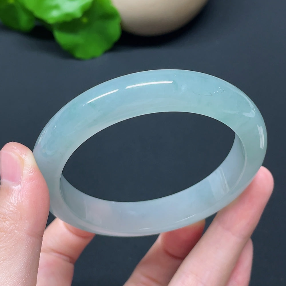 HKHQ jadeite round bangle in size 57.2 with 56.76g, showcasing smooth, polished jadeite bracelet with a glossy finish.