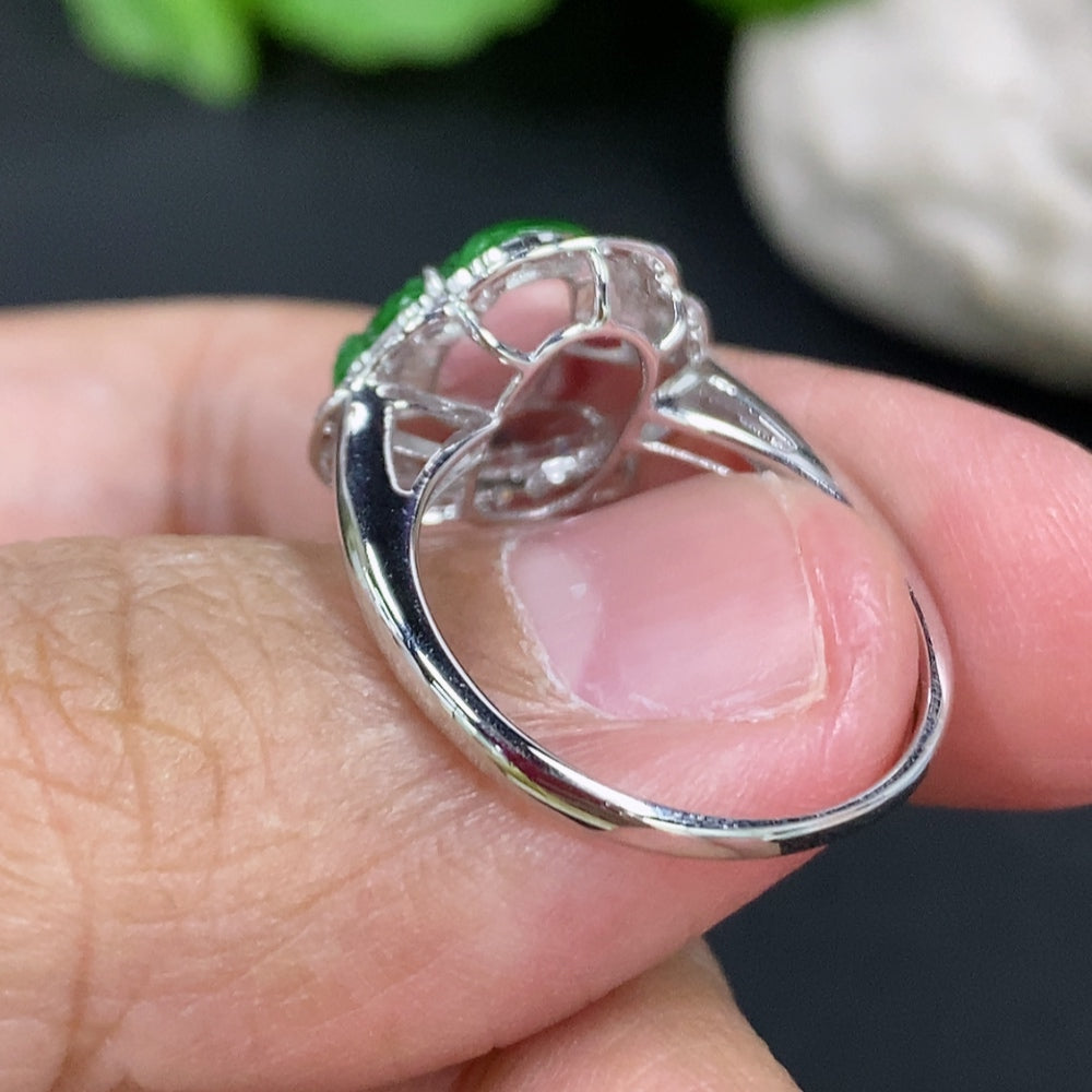Jadeite Buddha inlaid ring by HKHQ with 18k gold and diamond accents, size 14, weighing approximately 2.3 grams.