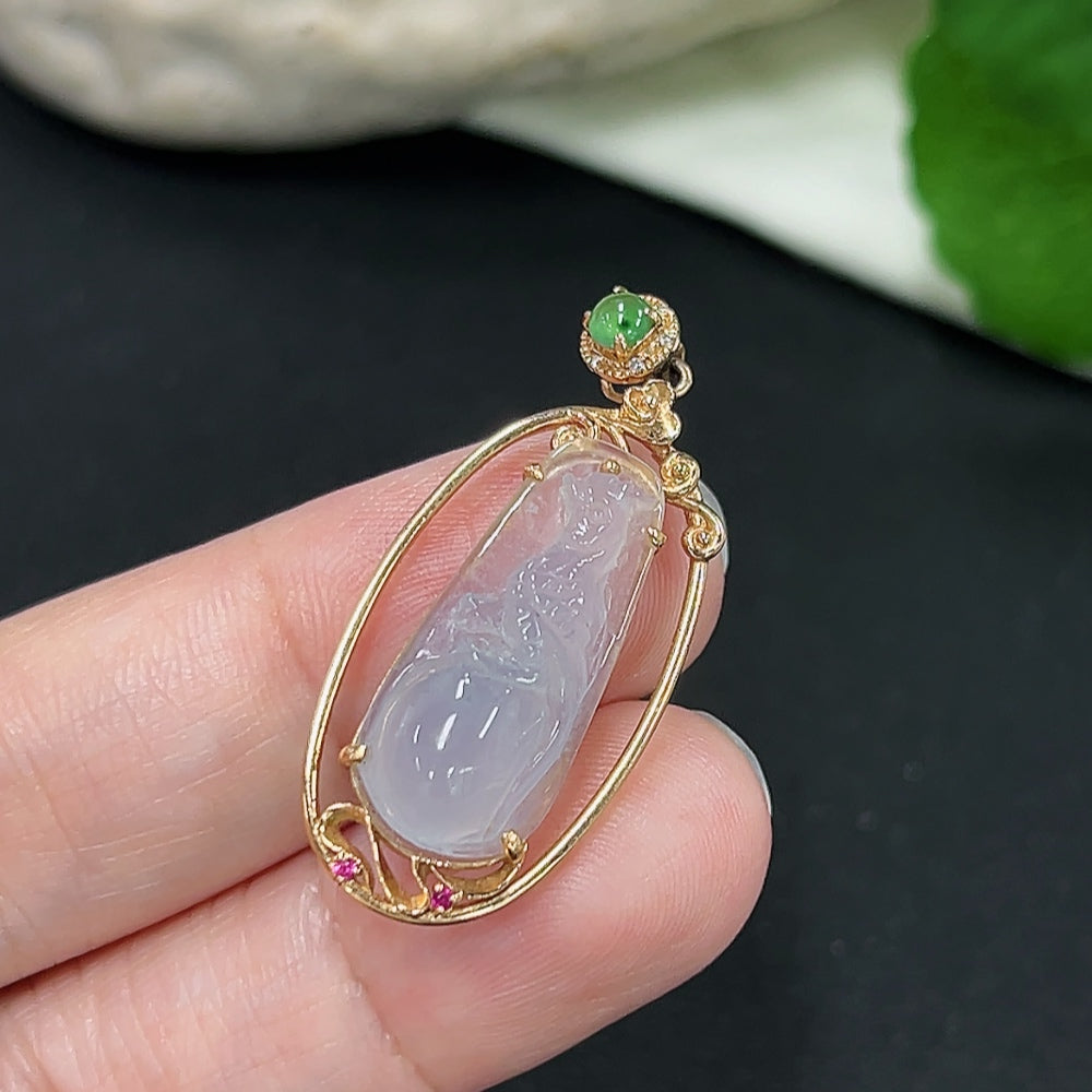 Jadeite pendant with 18K gold setting and diamond accents, weighs approx. 2.9g, displayed on a necklace chain.