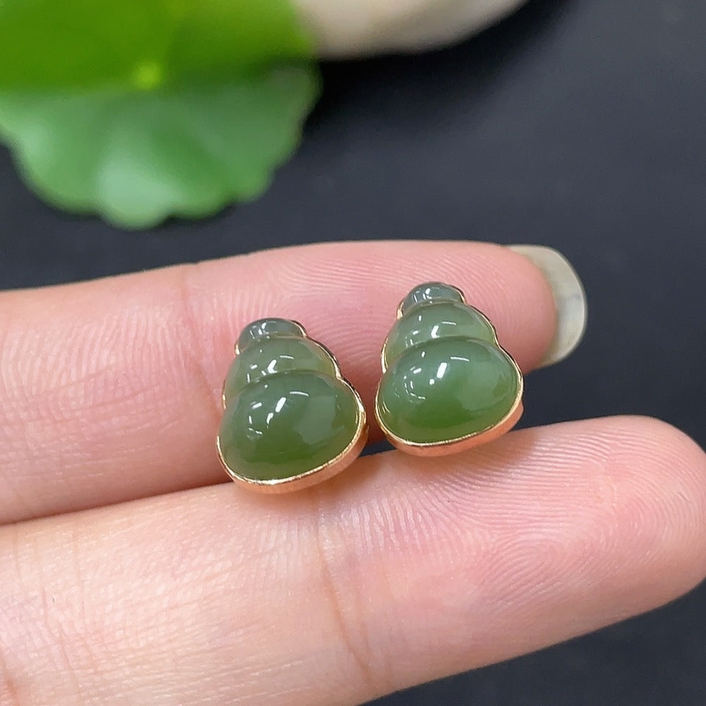 HKHQ Hetian Jade inlaid earrings with 18k gold, featuring elegant jade stones and lightweight ear stoppers, totaling 2.2g.