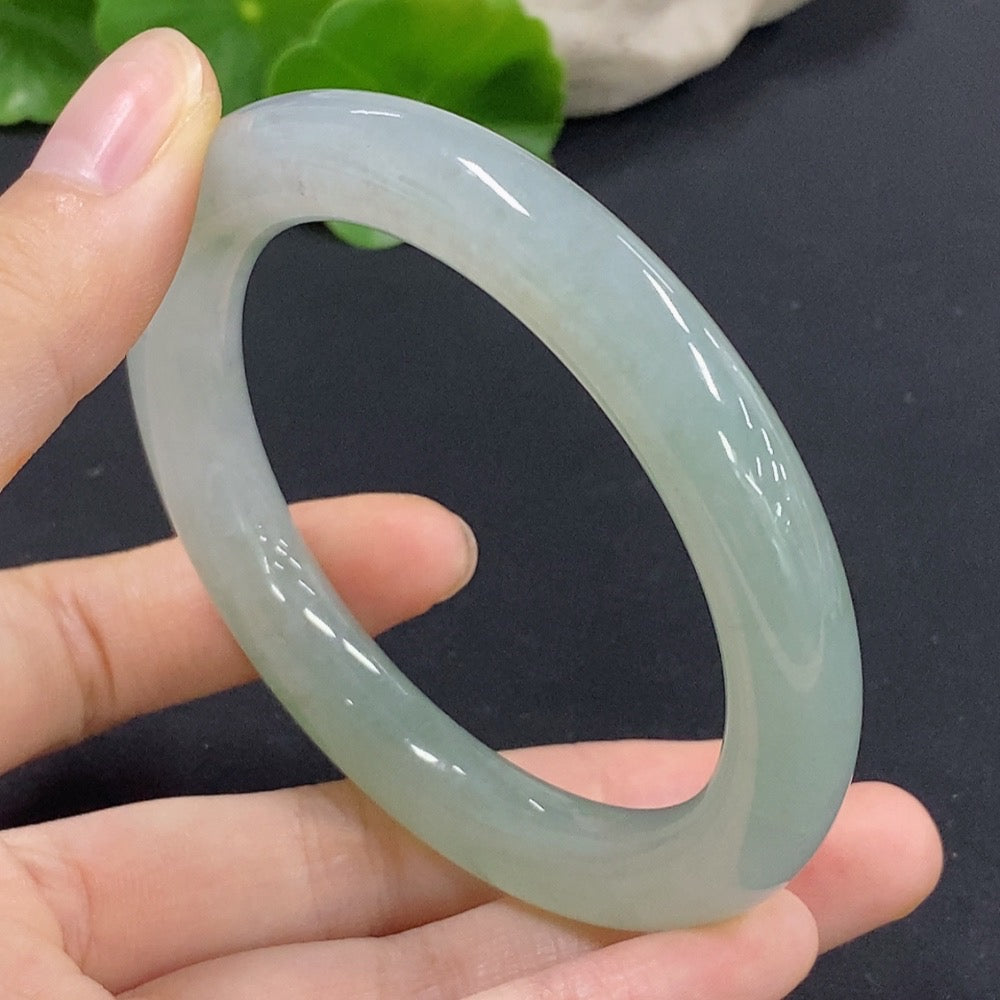HKHQ jadeite round bangle, size 56, smooth green jade with polished finish, weighs approximately 54.11g.