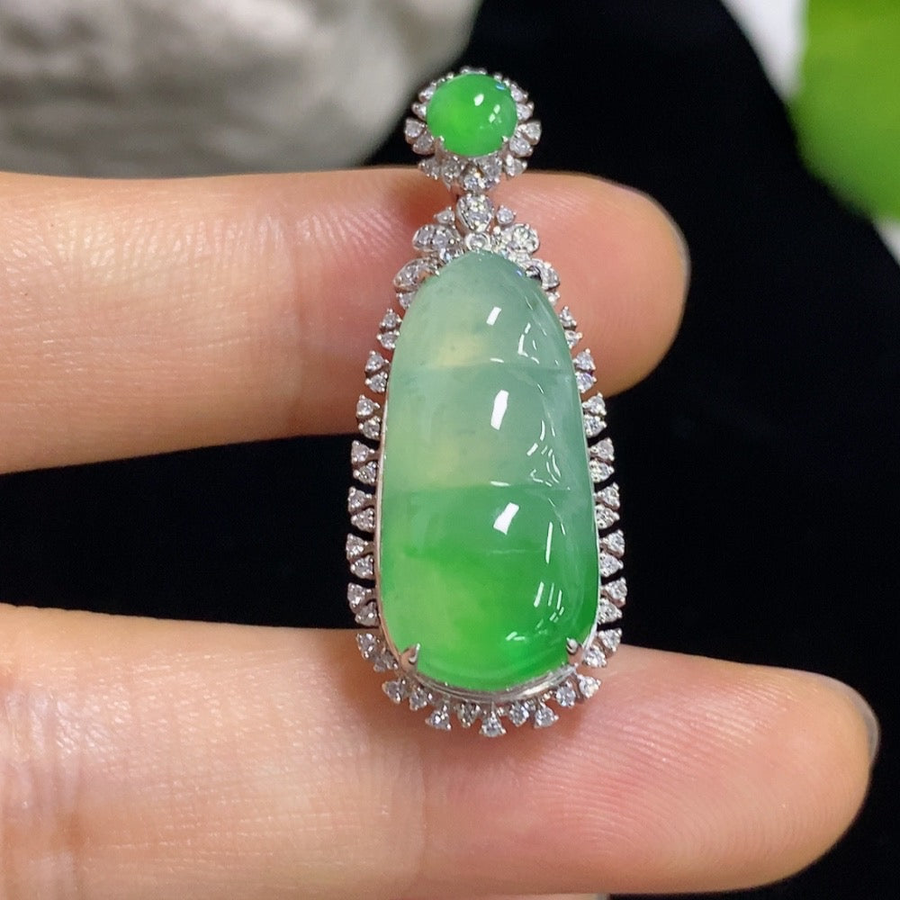 Jadeite lucky bean pendant with 18K gold and diamond accents, crafted by HKHQ, weighing approximately 5.05g.