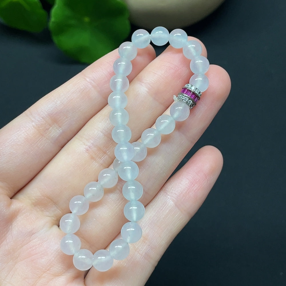 HKHQ Jadeite bracelet with non-gold beads, 10.66g total weight and 5.8mm bead size, featuring smooth, polished jade beads.