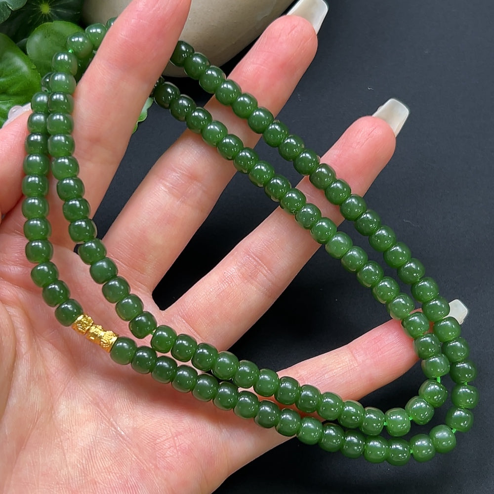Hetian jade bead necklace by HKHQ featuring 6.2mm smooth, polished non-gold jade beads on a classic string.