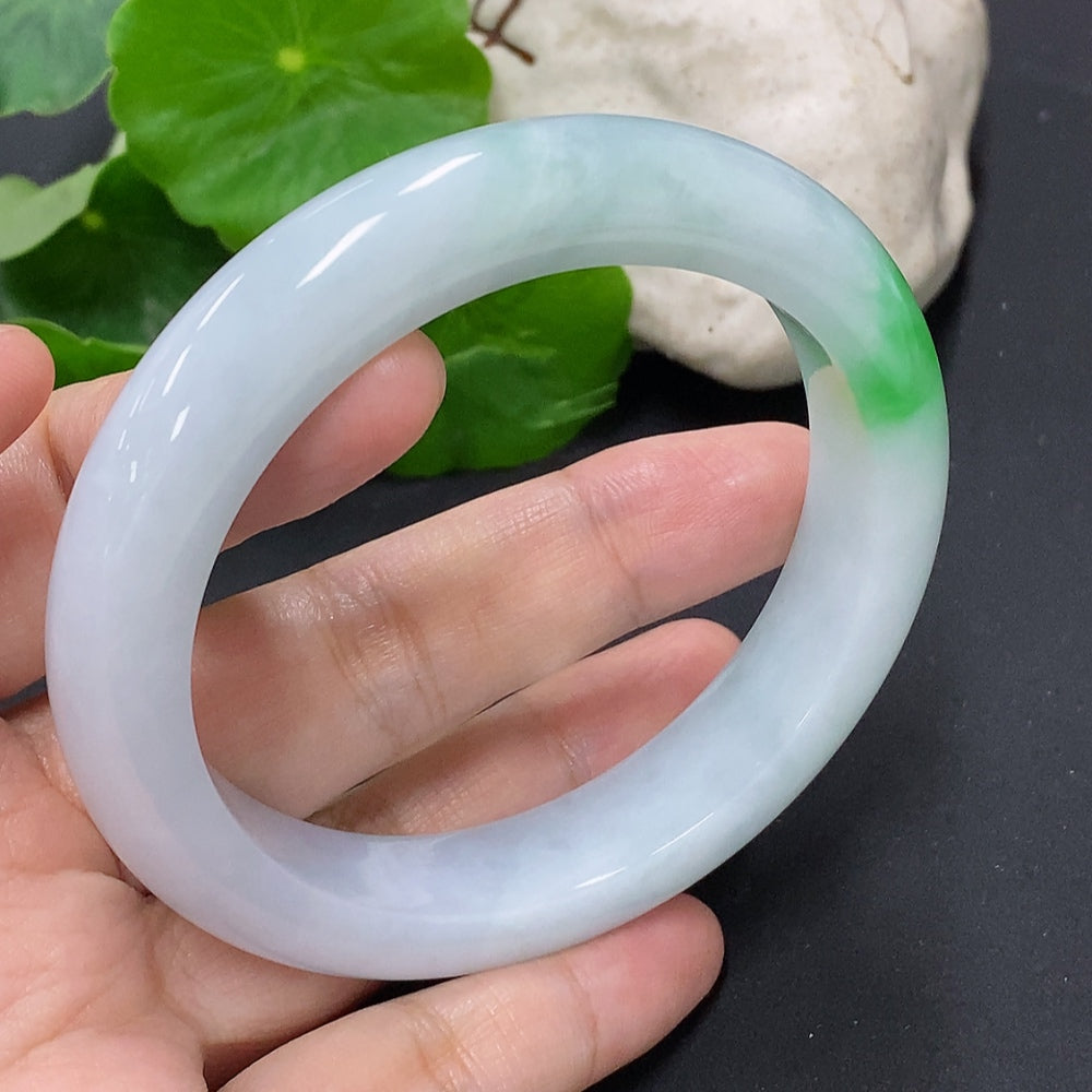 HKHQ jadeite round bangle, size 58.8, weighing approx. 68.6g, smooth green jade jewelry on a neutral background