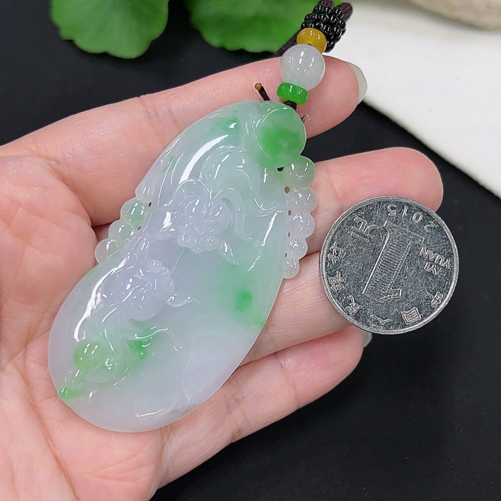 Jadeite goldfish pendant from HKHQ featuring a detailed goldfish design, weighing approximately 30.5 grams with rope.