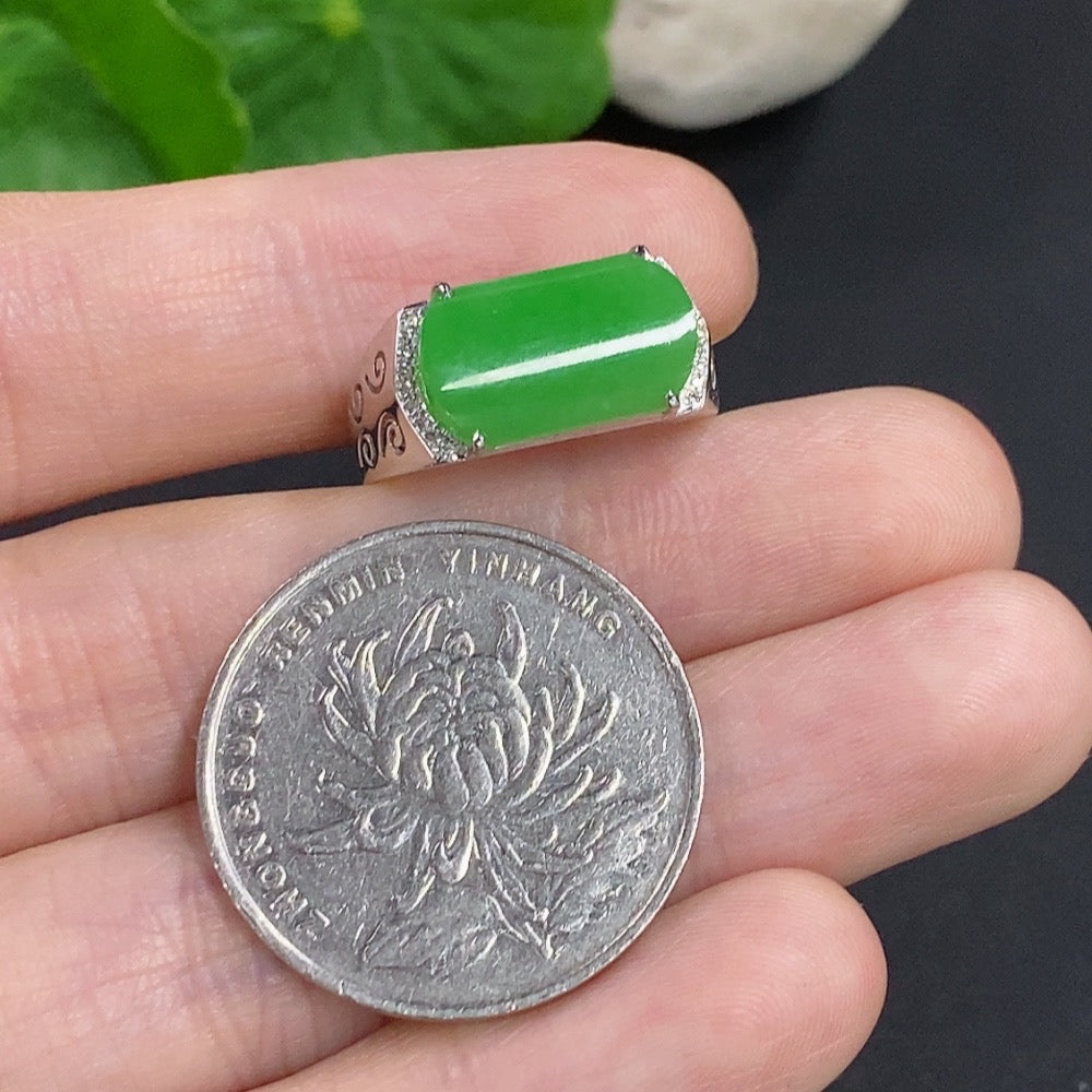 Jadeite cabochon ring with diamond accents in 18k gold, size 13, weighing approximately 3 grams, by HKHQ.