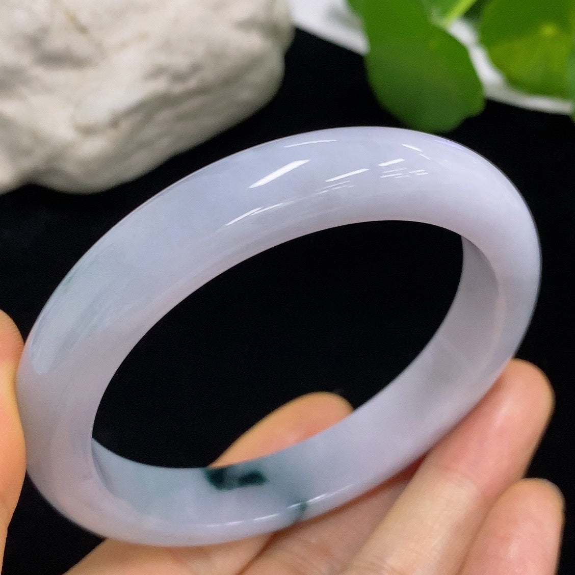 Jadeite round bangle from HKHQ, size 57.6, with a total weight of 54.77g, featuring smooth, polished jade surface.