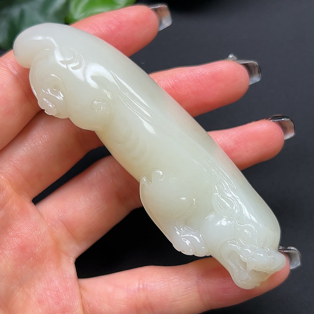 Hetian Jade Pixiu pendant from HKHQ, carved from green jade, weighing approximately 80g, featuring intricate Chinese design.
