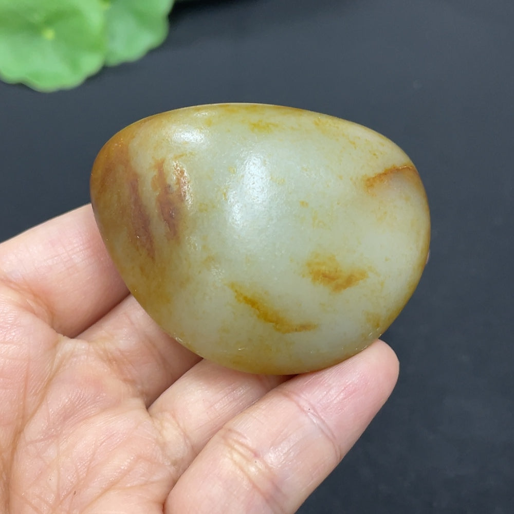 Hetian Jade jewelry piece with natural mineral components, weighs approximately 75.4g, showcasing its unique jade and mineral details.