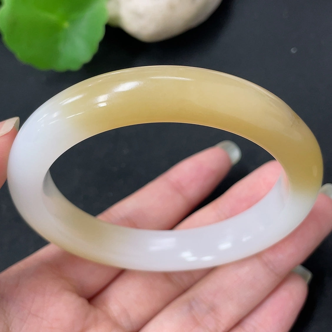 Hetian jade round bracelet by HKHQ, featuring smooth jade beads, size 57.3 mm, weighing approximately 52.5 grams.